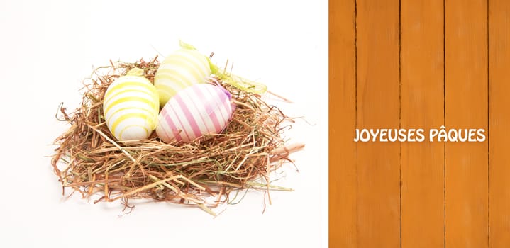 Joyeuses paques against wooden planks