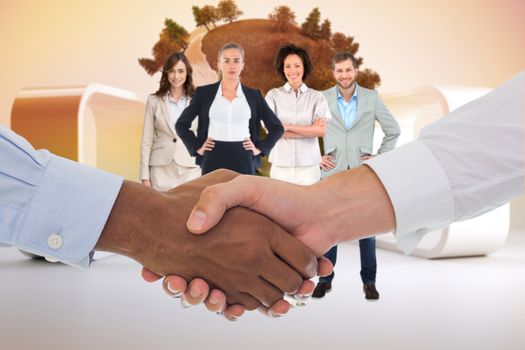 Close-up shot of a handshake in office against earth with trees on abstract background