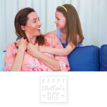 mothers day greeting against mother and daughter smiling at each other