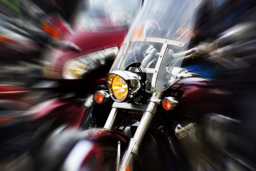 motorcycle rushing at city street, blurred motion