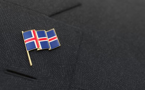 Iceland flag lapel pin on the collar of a business suit jacket shows patriotism