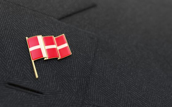 Denmark flag lapel pin on the collar of a business suit jacket shows patriotism