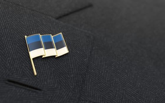 Estonia flag lapel pin on the collar of a business suit jacket shows patriotism