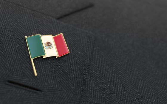 Mexican flag lapel pin on the collar of a business suit jacket shows patriotism