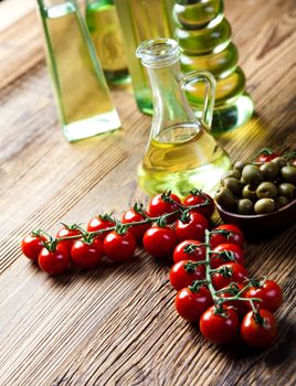 Olive oils in bottles, Mediterranean rural theme