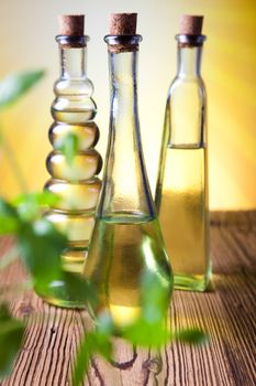 Olive oils in bottles, Mediterranean rural theme