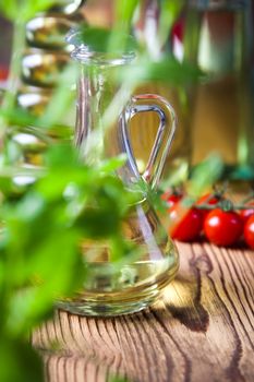 Olive oils in bottles, Mediterranean rural theme