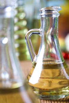 Olive oils in bottles, Mediterranean rural theme