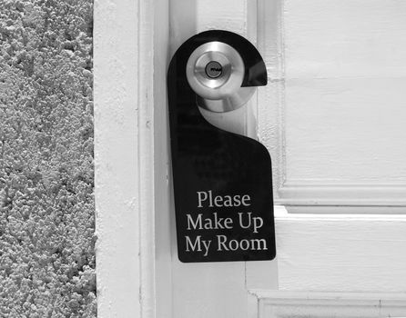 Please make up my room sign on door knob in hotel