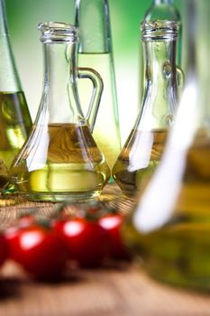 Olive oils in bottles, Mediterranean rural theme