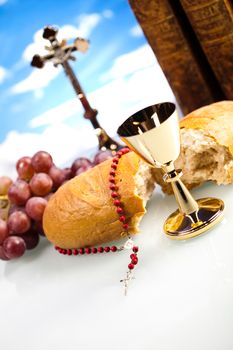 Christian holy communion, bright background, saturated concept