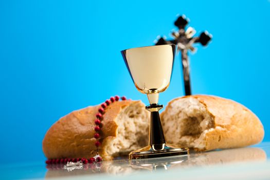 Christian holy communion, bright background, saturated concept