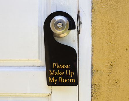 Please make up my room sign on door knob in hotel