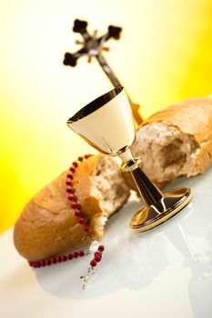 Christian holy communion, bright background, saturated concept