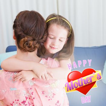 mothers heart against little girl with her mother on sofa