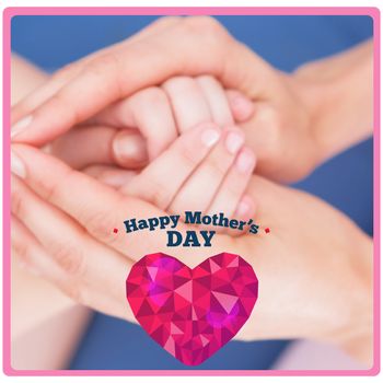 happy mothers day against mother and daughter touching hands