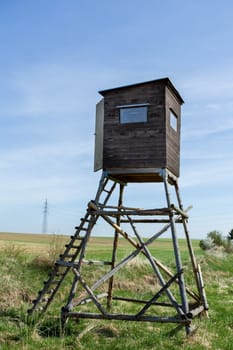Wooden Hunters High Seat hunting tower in rural Landscape, Czech Republic Scenery 