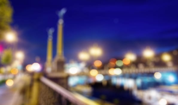 Blured lights from night Prague, view from river Vltava
