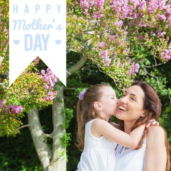 mothers day greeting against mother and daughter spending time
