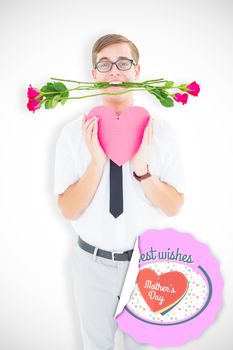 Geeky hipster holding red roses and heart card against mothers day greeting