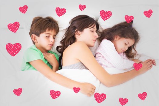 Mother asleep with her children against red hearts