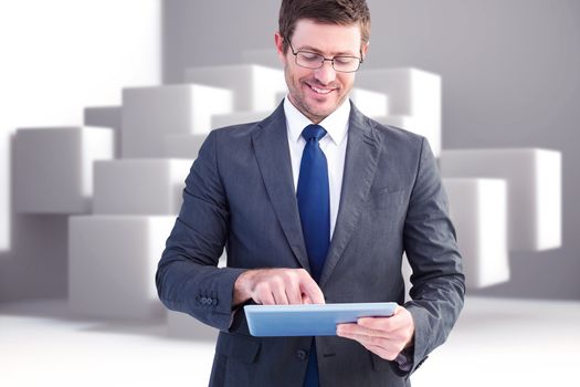 Businessman using his tablet pc  against abstract background