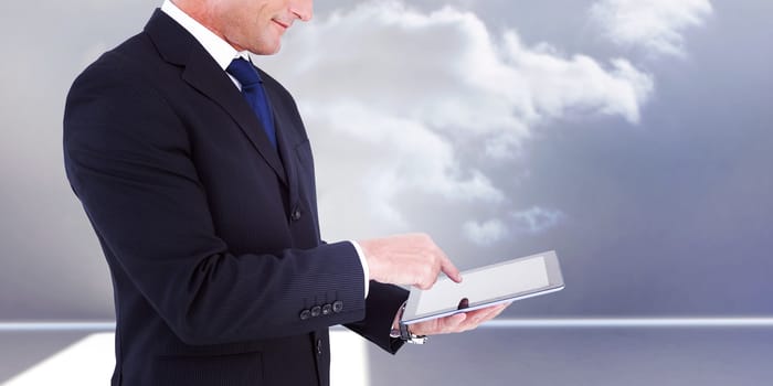 Mid section of a businessman with arms out against clouds in a room