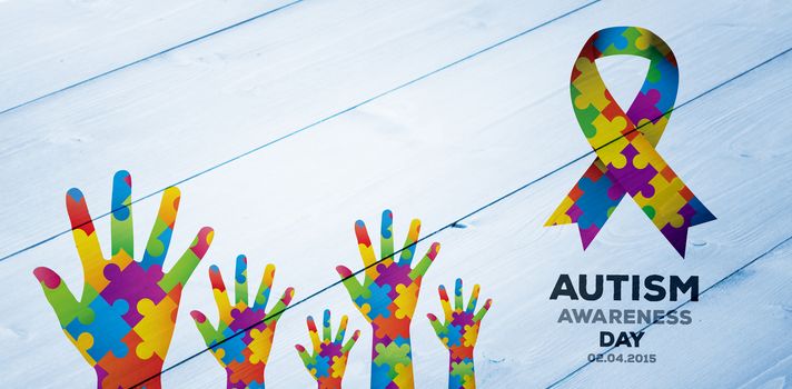 Autism awareness day against bleached wooden planks background