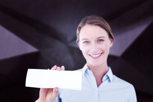 Businesswoman showing her business card  against abstract black room