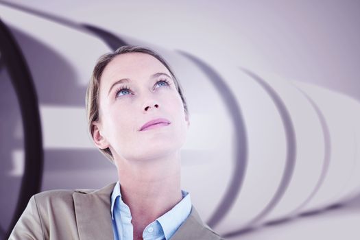 Thoughtful businesswoman in suit  against white abstract room