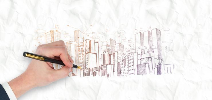 Hand holding a fountain pen against crumpled white page 