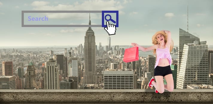 Pretty young blonde holding shopping bags against large city