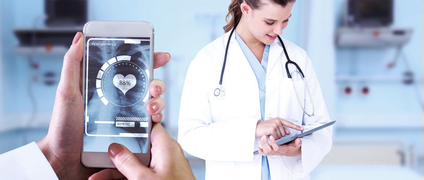 Hand holding smartphone against sterile bedroom