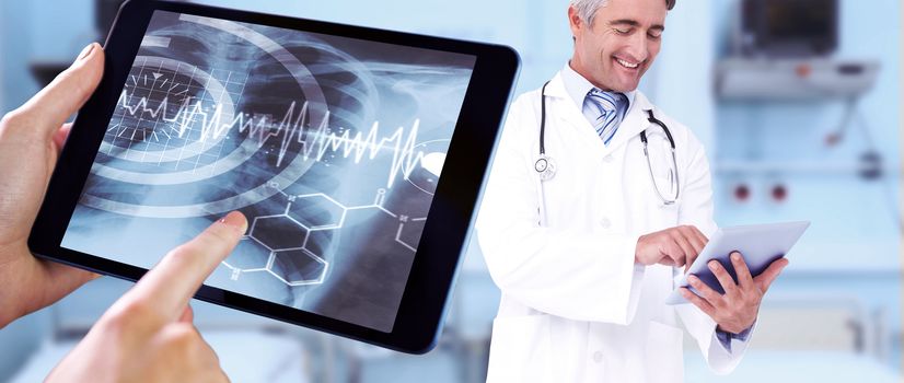 Man using tablet pc against sterile bedroom
