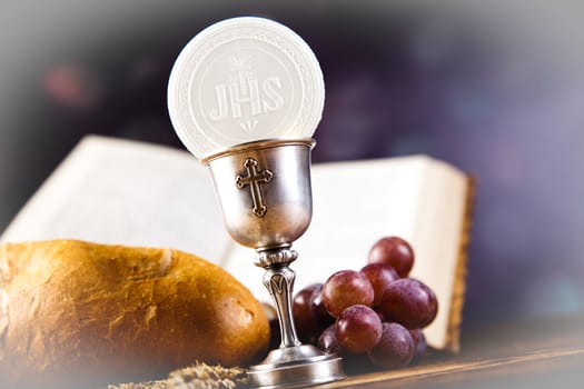 Eucharist, sacrament of communion, bright background, saturated concept