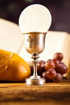 Eucharist, sacrament of communion, bright background, saturated concept