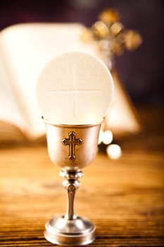 Eucharist, sacrament of communion, bright background, saturated concept