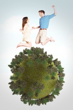 Cheerful young couple jumping against blue sky