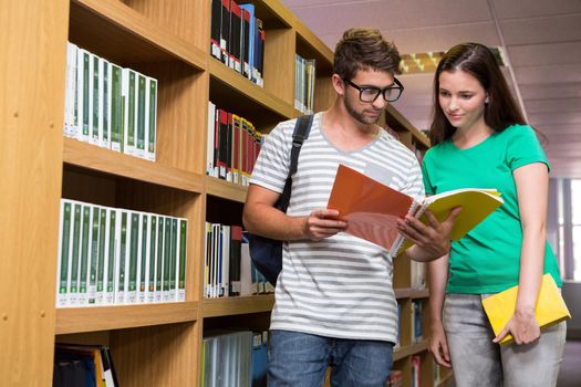 Students reading in the library at the university 