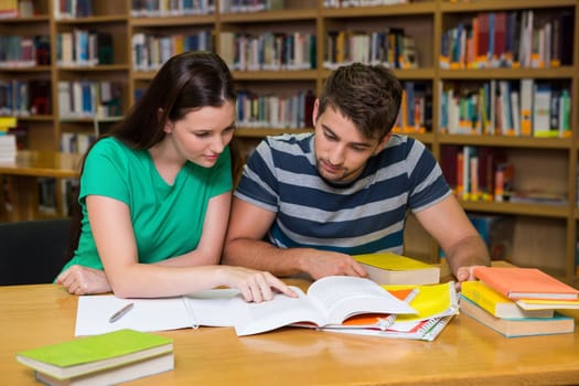 Students studying together in the library at the university 