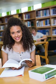 Student studying in the library at the university