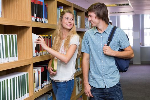 Students discussing in the library at the university