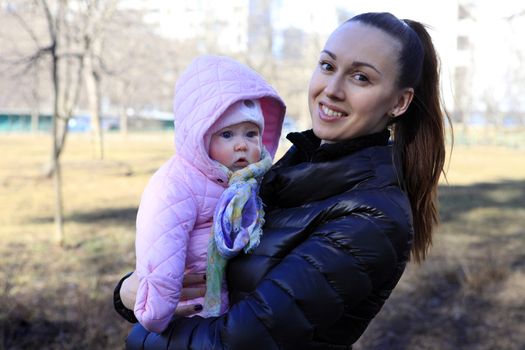 Happy mother and daughter in the park