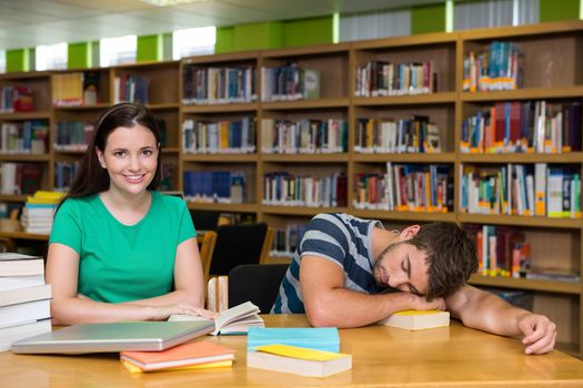 Students studying together in the library at the university 