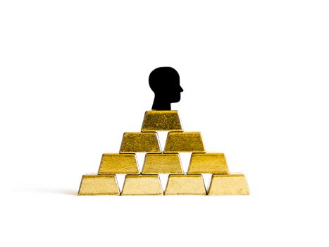 Golden bricks: wealth conceptualisation isolated with tokens