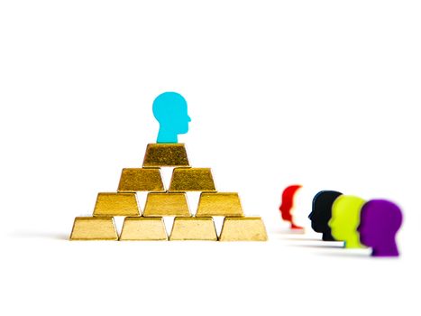 Golden bricks: wealth inequality conceptualisation isolated with tokens