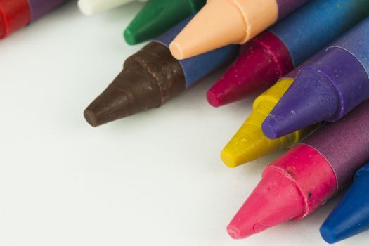 Close up of different coloured crayons