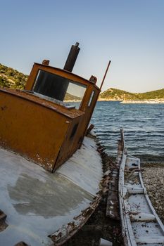 Abandoned fishing trawler on beach at Alonissos, Greece