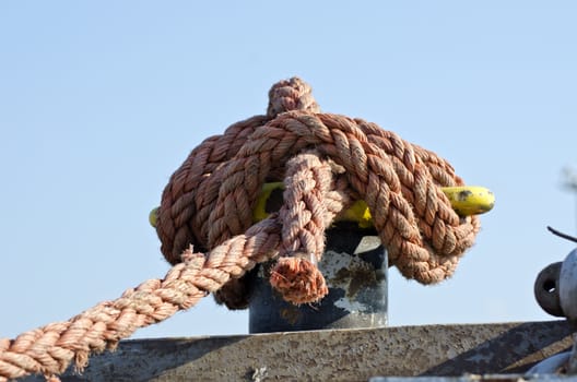 rope tool on sea ship fence