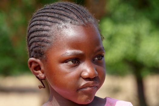 NAMIBIA, KAVANGO, OCTOBER 15: Unidentified child girl near town Rundu. Kavango is region with the highest poverty level in Namibia. October 15, 2014, Namibia